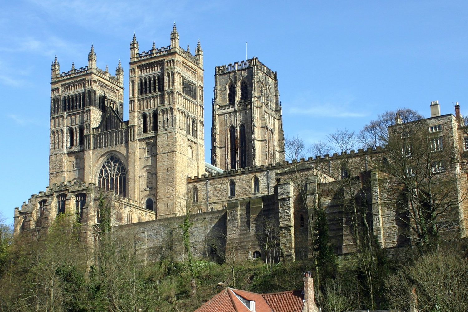 Durham Cathedral seen from across the River Wear, with the old fulling mill on the bank below it.